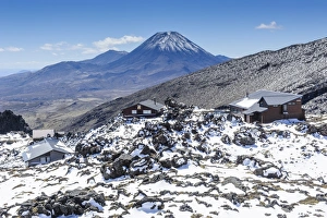 View from Mount Ruapehu of Mount Ngauruhoe with a ski cottage in the foreground, Tongariro National Park View from Mount Ruapehu of Mount Ngauruhoe with a ski cottage in the foreground, Tongariro National Park