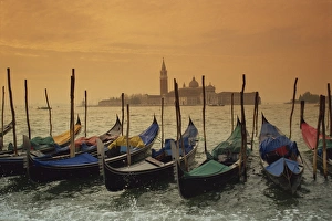 Venice Grand Canal Prints: View past docked gondolas towards St. Marks Square, from across the Grand Canal
