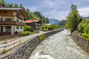 View of river through Fieberbrunn, Fieberbrunn, Austrian Alps, Tyrol, Austria, Europe View of river through Fieberbrunn, Fieberbrunn, Austrian Alps, Tyrol, Austria, Europe
