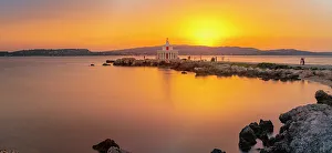 Ionian Islands Scenery Prints: View of Saint Theodore Lighthouse at sunset
