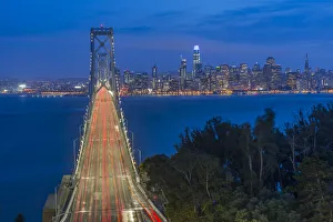 View of San Francisco skyline and Oakland Bay Bridge from Treasure Island at night View of San Francisco skyline and Oakland Bay Bridge from Treasure Island at night