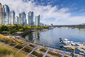 View of seaplane and urban office buildings around Vancouver Harbour, Downtown, Vancouver View of seaplane and urban office buildings around Vancouver Harbour, Downtown, Vancouver