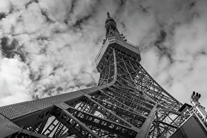 Honshu Island Landmarks Prints: View of Tokyo Tower from its base against cloudy sky