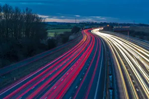 View of traffic trail lights on M1 motorway near Chesterfield, Derbyshire, England View of traffic trail lights on M1 motorway near Chesterfield, Derbyshire, England