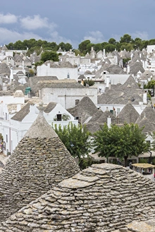 View of the typical Trulli built with dry stone with a conical roof, Alberobello View of the typical Trulli built with dry stone with a conical roof, Alberobello