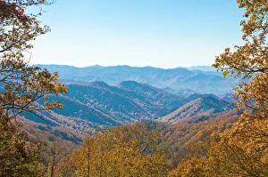 View over valley with colourful foliage in the Indian summer View over valley with colourful foliage in the Indian summer