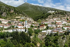 European Mountain Scenery Photos Prints: View of whitewashed buildings on mountainside, village of Dhermi, Albania, Europe