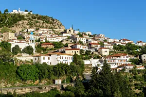 Village Life In Europe Prints: View of whitewashed buildings on mountainside, village of Dhermi, Albania, Europe