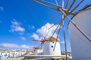 Greek Island Views Prints: View of windmills and town in background, Mykonos Town, Mykonos, Cyclades Islands