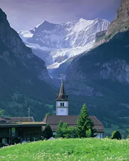 Prints of Village church and Oberer Grindelwald Glacier, Grindelwald, Jungfrau Region, Bernese Oberland, Swiss Alps, Switzerland, Europe Switzerland Prints: Print of Grindelwald Village Church and Glacier