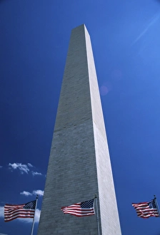 Washington Monument and stars and stripes flags, Washington D Washington Monument and stars and stripes flags, Washington D