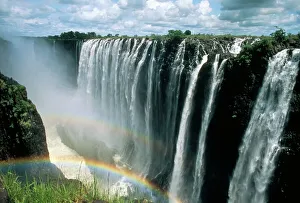 Waterfalls and rainbows, Victoria Falls, UNESCO World Heritage Site, Zambia, Africa Waterfalls and rainbows, Victoria Falls, UNESCO World Heritage Site, Zambia, Africa