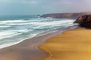 North African Coastline Prints: Waves breaking coastal cliffs and sandy beach