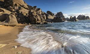 Mediterranean Sea Waves Prints: Waves crashing on the sandy beach framed by cliffs, Capo Testa, Santa Teresa di Gallura