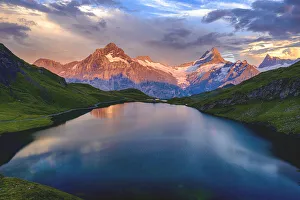 Wetterhorn, Schreckhorn and Finsteraarhorn at sunset from Bachalpsee lake, Grindelwald Wetterhorn, Schreckhorn and Finsteraarhorn at sunset from Bachalpsee lake, Grindelwald