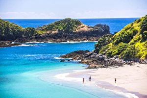 White sandy beach in the Bay of Islands, in the Waikare Inlet, visited by sailing boat from Russell White sandy beach in the Bay of Islands, in the Waikare Inlet, visited by sailing boat from Russell
