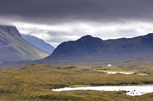 Whitewashed cottage on desolate moorland near Sligachan, Isle of Skye, Highland Whitewashed cottage on desolate moorland near Sligachan, Isle of Skye, Highland