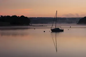 Wimbleball Lake at dawn, Exmoor National Park, Somerset, England, United Kingdom, Europe Wimbleball Lake at dawn, Exmoor National Park, Somerset, England, United Kingdom, Europe