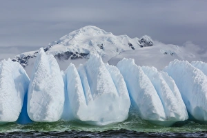 Wind and water sculpted iceberg in Orne Harbor, Antarctica, Polar Regions Wind and water sculpted iceberg in Orne Harbor, Antarctica, Polar Regions