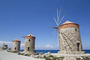 Windmills of Mandraki, Fort of St. Nicholas in the background, Mandraki Harbour, Rhodes Windmills of Mandraki, Fort of St. Nicholas in the background, Mandraki Harbour, Rhodes