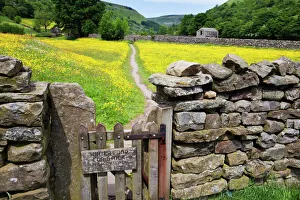 Winter Food for Stock sign on gate in meadow at Muker, Swaledale, Yorkshire Dales, Yorkshire, England, United Kingdom Winter Food for Stock sign on gate in meadow at Muker, Swaledale, Yorkshire Dales, Yorkshire, England, United Kingdom