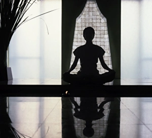 Woman meditating, Bangkok, Thailand, Southeast Asia, Asia Woman meditating, Bangkok, Thailand, Southeast Asia, Asia