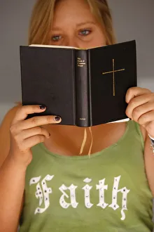 Young Christian reading the Bible, Saint-Gervais, Haute Savoie, France, Europe Young Christian reading the Bible, Saint-Gervais, Haute Savoie, France, Europe