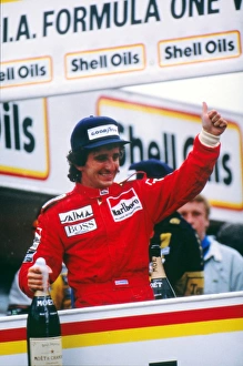 Alain Prost celebrates winning his first world title in 1985 Alain Prost celebrates winning his first world title in 1985