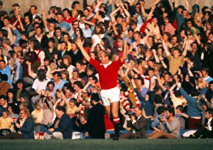 Bobby Charlton celebrates his sides goal in his last home game for Manchester United Bobby Charlton celebrates his sides goal in his last home game for Manchester United