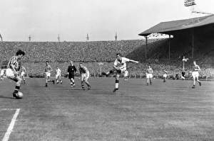 Bobby Charlton shoots during the 1957 FA Cup Final Bobby Charlton shoots during the 1957 FA Cup Final
