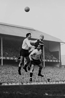 Dave Mackay and Maurice Norman jump for Spurs against Evertons Alex Young Dave Mackay and Maurice Norman jump for Spurs against Evertons Alex Young