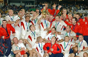 The England team celebrate after winning the rugby World Cup The England team celebrate after winning the rugby World Cup