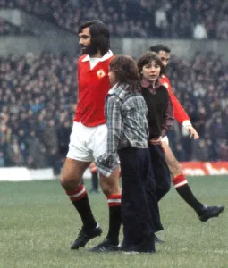 George Best Prints: George Best Print - Young Fans Greet Manchester United Star