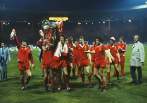 The Liverpool team celebrate winning the 1978 European Cup in this print