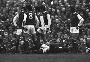 Frank McLintock points the finger at an Ipswich player as Bob Wilson lies injured Frank McLintock points the finger at an Ipswich player as Bob Wilson lies injured