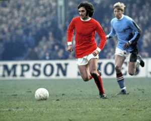 George Best Chased by Colin Bell 1969. Art Prints from