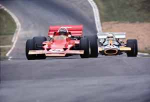 Jochen Rindt and Jack Brabham approach Druids at the 1970 British Grand Prix at Brands Jochen Rindt and Jack Brabham approach Druids at the 1970 British Grand Prix at Brands