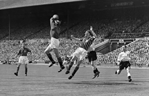 Manchester City goalkeeper Bert Trautmann collects a high ball - 1956 FA Cup Final Manchester City goalkeeper Bert Trautmann collects a high ball - 1956 FA Cup Final