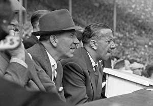 Manchester United manager Matt Busby sits on the bench with caretaker manager Jimmy Murphy - 1958 FA Cup Final Manchester United manager Matt Busby sits on the bench with caretaker manager Jimmy Murphy - 1958 FA Cup Final