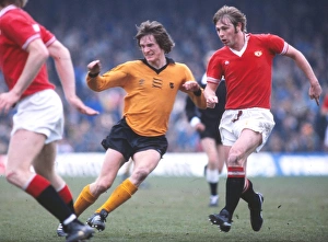 Manchester Uniteds Brian Greenhoff and Wolves Mel Eves Manchester Uniteds Brian Greenhoff and Wolves Mel Eves