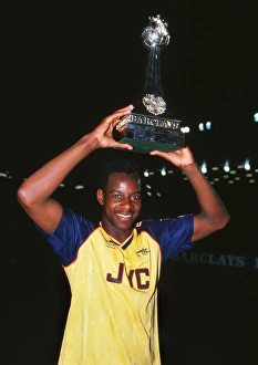 Michael Thomas celebrates with the league trophy after winning the 1988/9 title Michael Thomas celebrates with the league trophy after winning the 1988/9 title