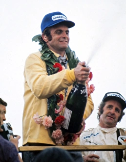 Peter Revson celebrates after winning the 1973 British Grand Prix Peter Revson celebrates after winning the 1973 British Grand Prix