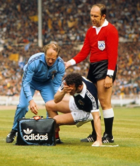 Scotlands Danny McGrain is injured - 1977 British Home Championship Scotlands Danny McGrain is injured - 1977 British Home Championship
