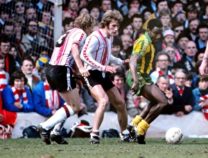West Broms Laurie Cunningham under pressure from Southamptons David Peach and Nick Holmes West Broms Laurie Cunningham under pressure from Southamptons David Peach and Nick Holmes