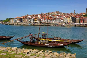 Boats for transporting port wine casks on the River Douro, Porto, Portugal Boats for transporting port wine casks on the River Douro, Porto, Portugal