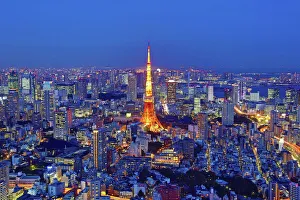 City skyline view of the Tokyo Tower and Tokyo, Japan at night City skyline view of the Tokyo Tower and Tokyo, Japan at night
