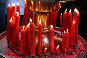 Red candles burning at the Longshan Buddhist Temple at Chinese New Year in Taipei, Taiwan Red candles burning at the Longshan Buddhist Temple at Chinese New Year in Taipei, Taiwan