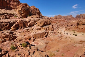 Tombs in sandstone rocks around the valley in the rock city of Petra, Jordan Tombs in sandstone rocks around the valley in the rock city of Petra, Jordan