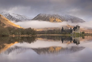The abandoned ruin of Kilchurn Castle on a misty winter morning, Loch Awe, Argyll & Bute, Scotland The abandoned ruin of Kilchurn Castle on a misty winter morning, Loch Awe, Argyll & Bute, Scotland