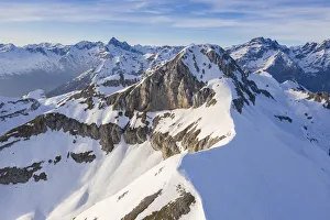 Aerial view of the top of the Monte Ferrante and Monte Ferrantino covered in snow in Aerial view of the top of the Monte Ferrante and Monte Ferrantino covered in snow in